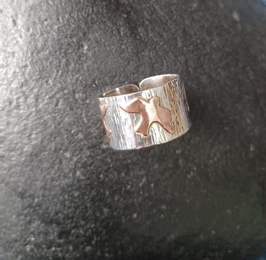 Silver and copper bird ring