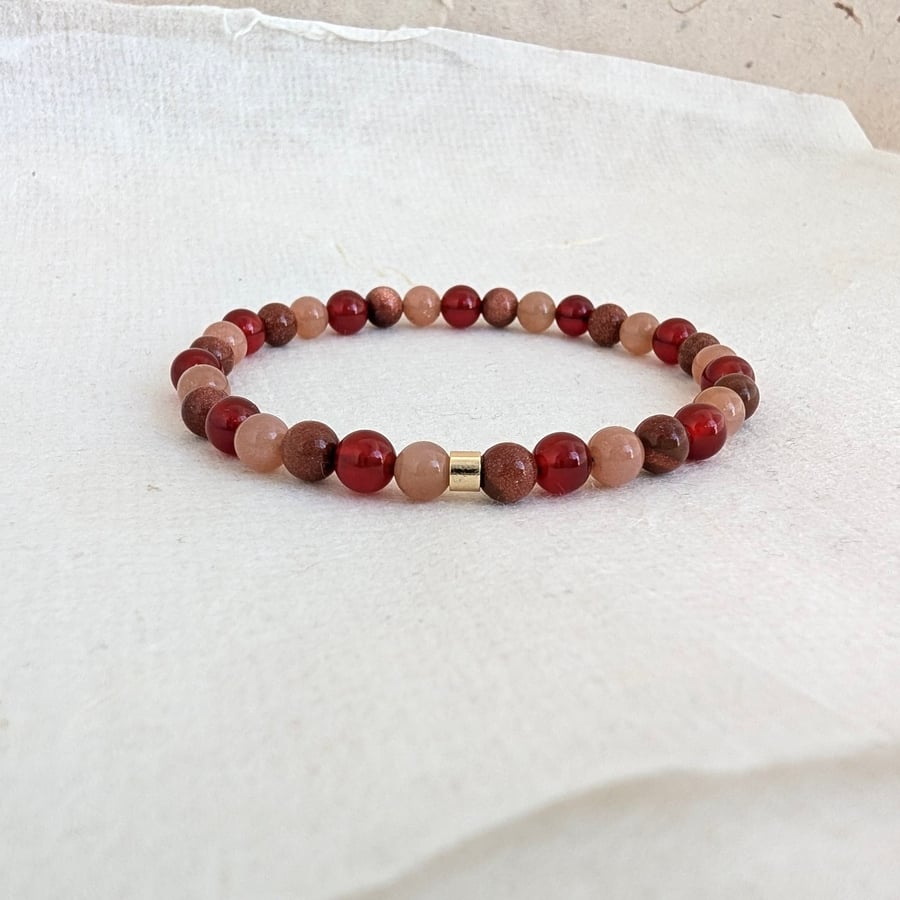 Sacral chakra stretch gemstone bracelet with carnelian, sunstone and goldstone