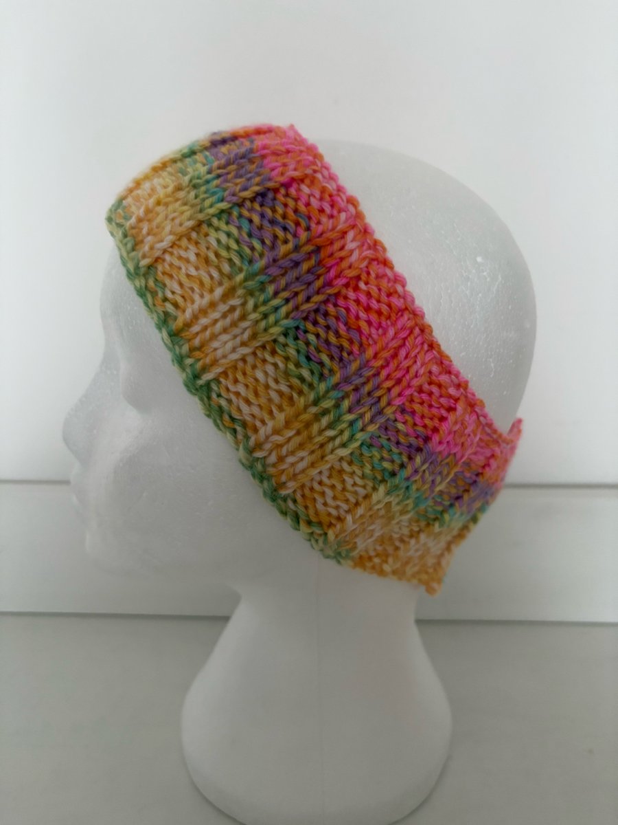 Hand knitted headband. 