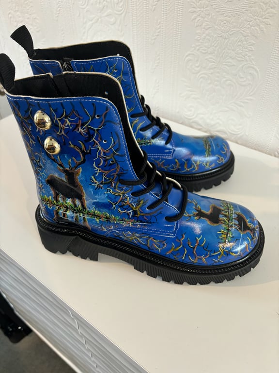 A pair of hand painted and sealed boots by Andrew Jenkins 