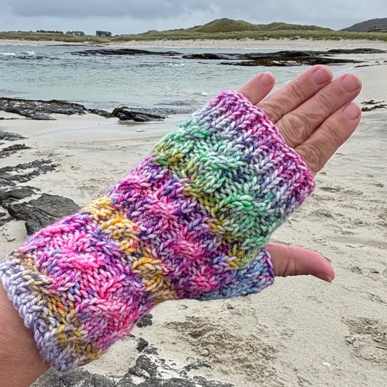 Hand knitted fingerless gloves, featuring cable knit pattern    TUTTI FRUTTI