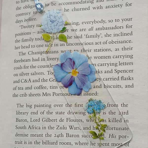Clear acrylic bookmark decorated with blue flowers decals 