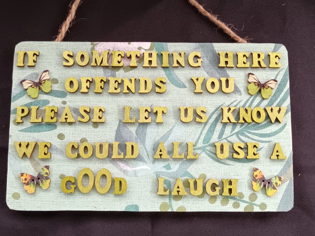 Hand decorated hanging wooden sign 