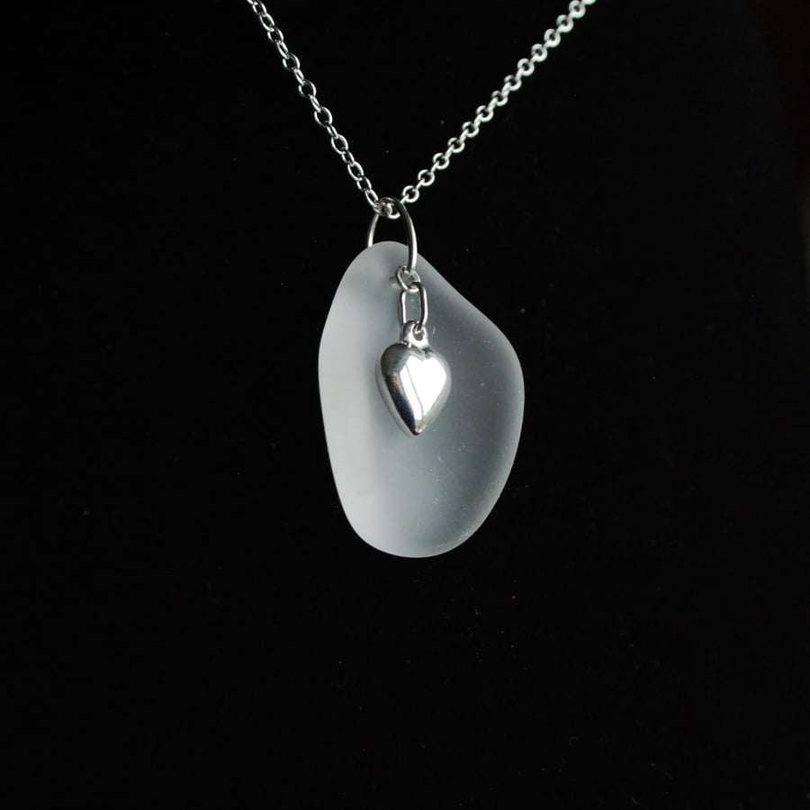 Curved white beach glass pendant with silver heart