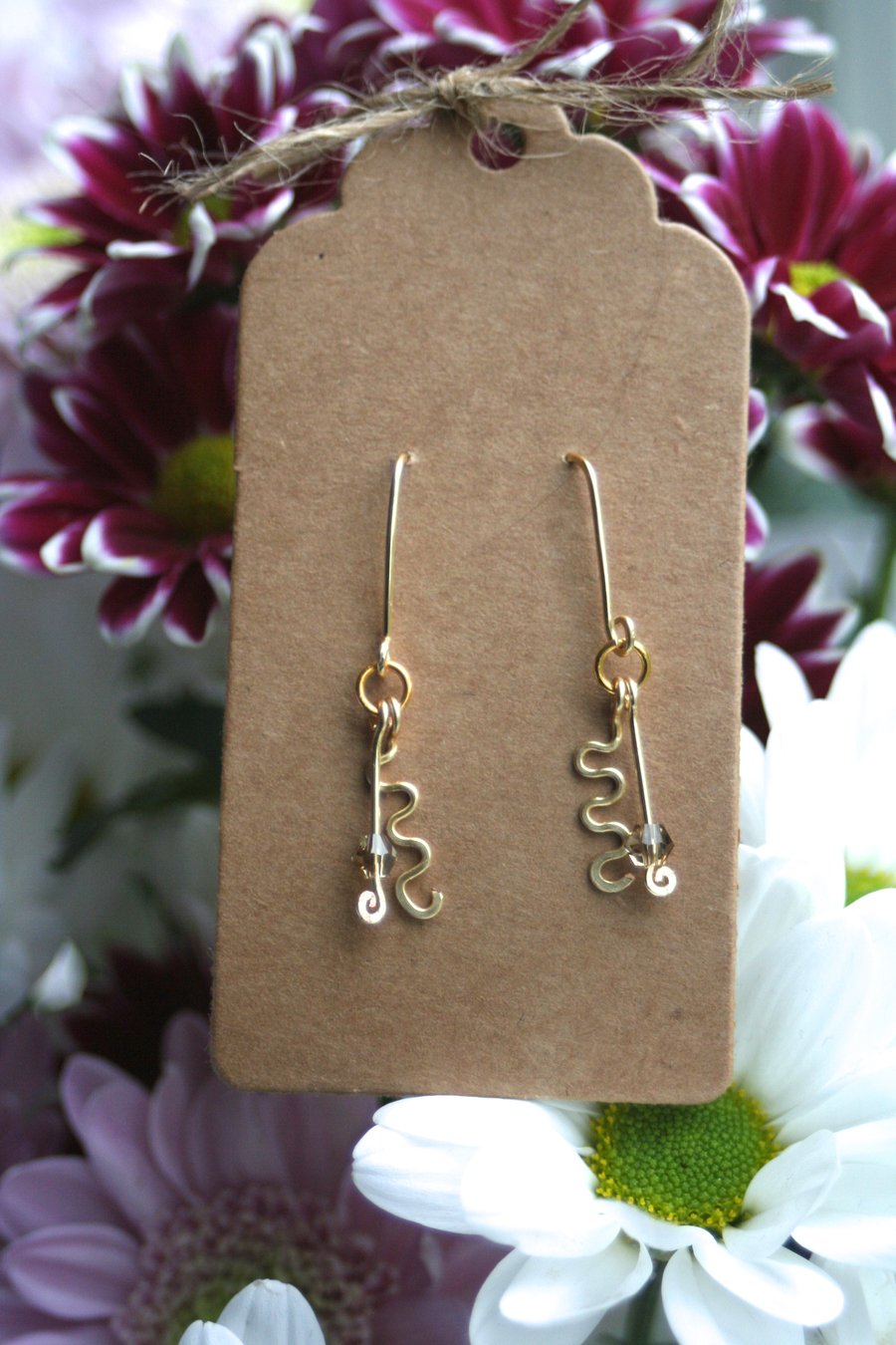 Gold plated curvy earrings