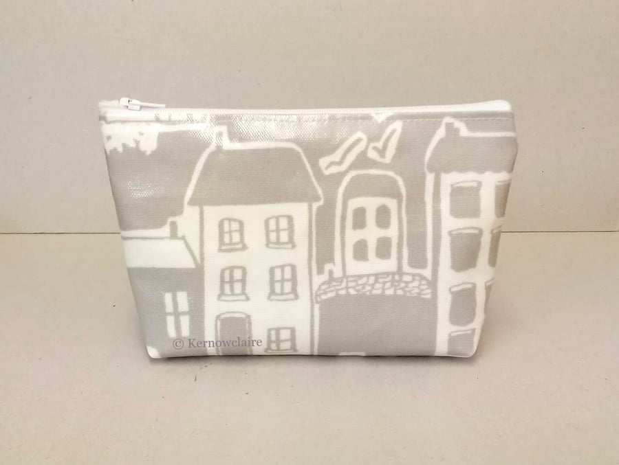 Grey make up bag with coastal village pattern