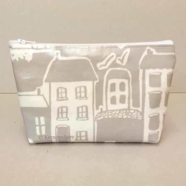 Grey make up bag with coastal village pattern