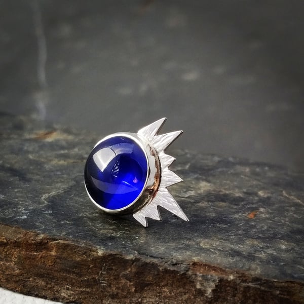 Asymmetric star mini brooch with blue zirconia gemstone