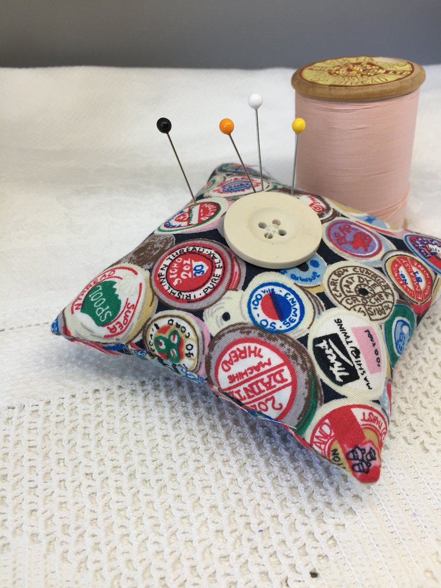 Cotton reel themed pin cushion 