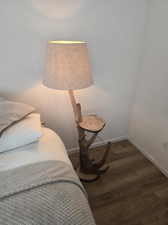 Rustic bedside table and lamp combination