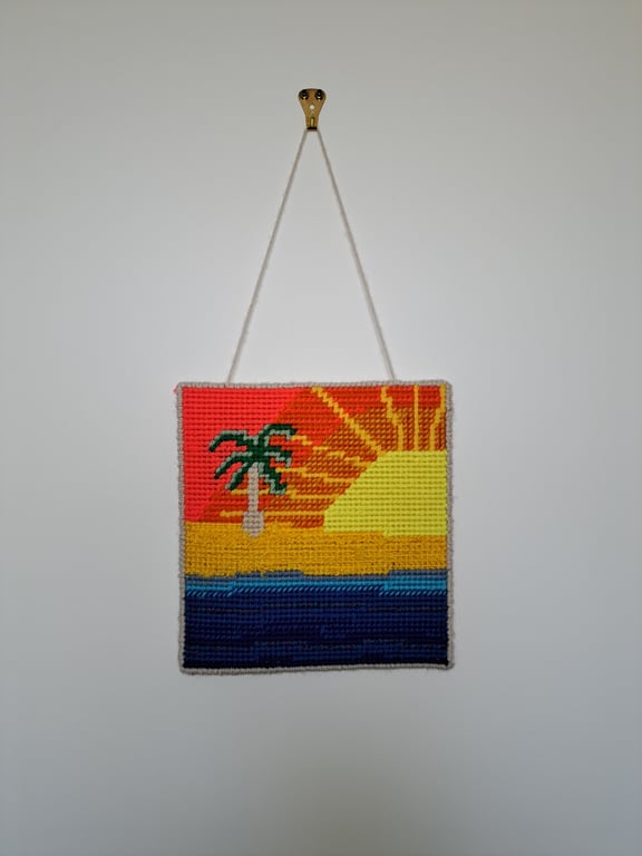 Wall art of a sunset island - adjustable hang length