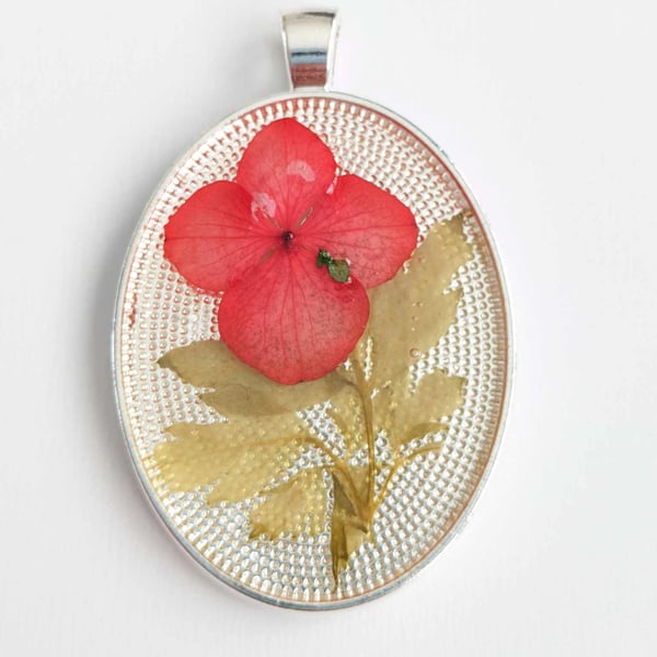 Large Resin Oval Pendant With Red Flower