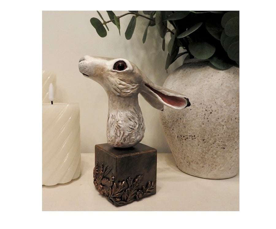 Unique hand crafted Sculpture of a brown Hare fixed on a wooden plinth