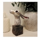 Unique hand crafted Sculpture of a brown Hare fixed on a wooden plinth