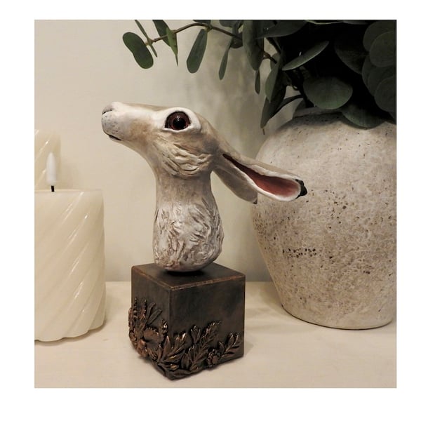 Unique hand crafted Sculpture of a brown Hare fixed on a wooden plinth