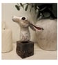 Unique hand crafted Sculpture of a brown Hare fixed on a wooden plinth