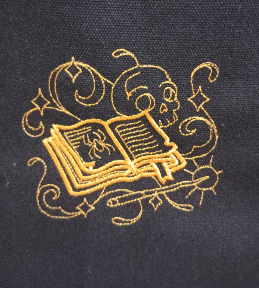 Tote Bag - Halloween Spell book embroidered in gold on a black canvas tote bag
