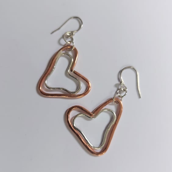 Nested Hearts Mixed Metal Dangle Earrings, Copper and Sterling silver.