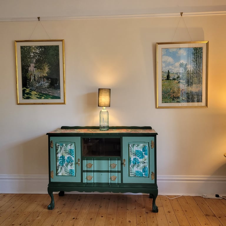 Upcycled wooden vintage ball and claw footed sideboard with a tropical theme