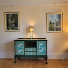 Upcycled wooden vintage ball and claw footed sideboard with a tropical theme