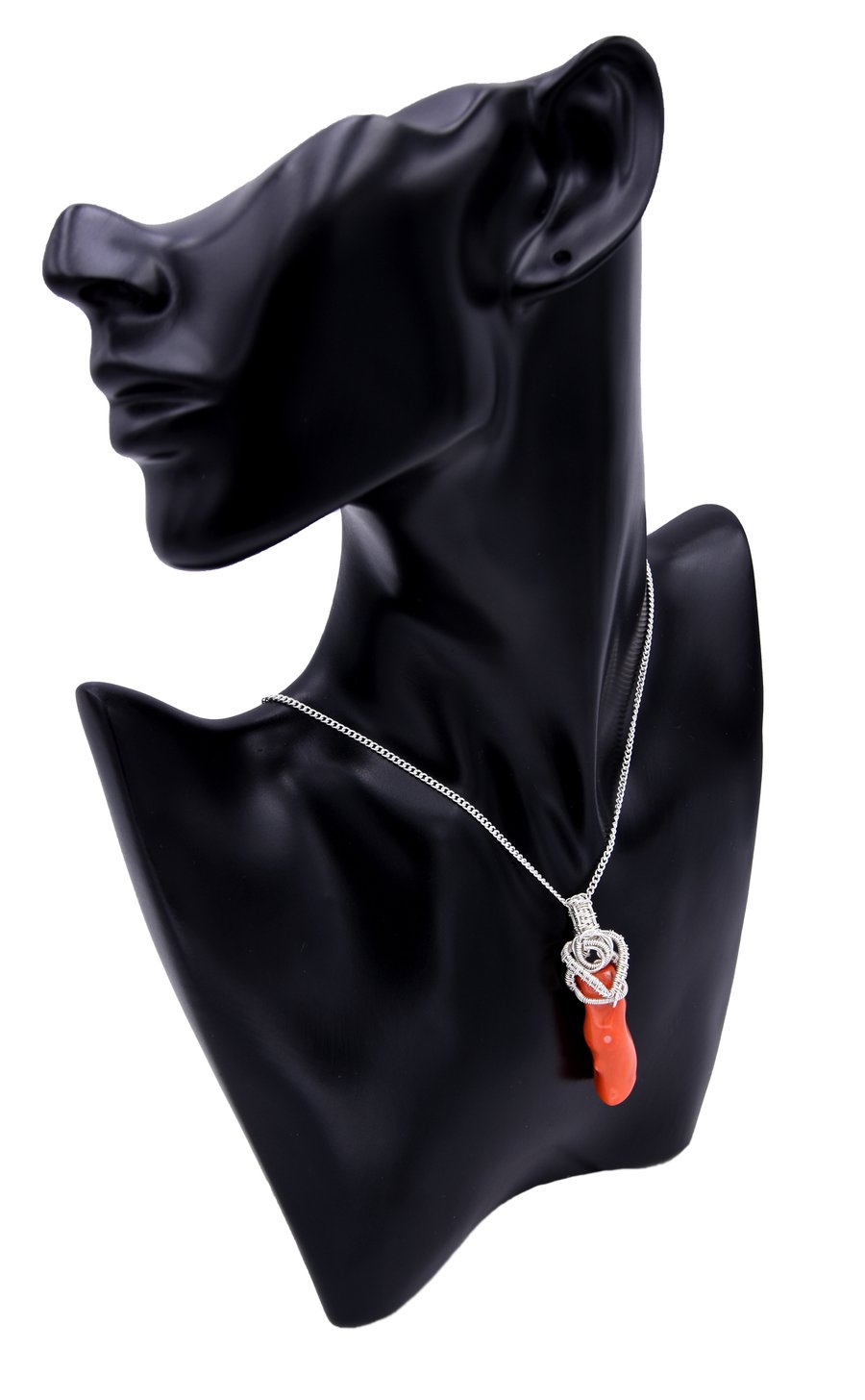 Elongated coral pendant