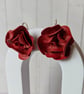 Red rose drop earrings.