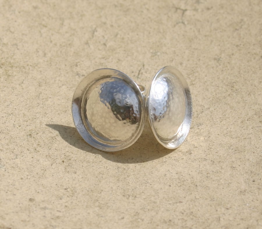 Double domed stud earrings with a subtle hammered finish