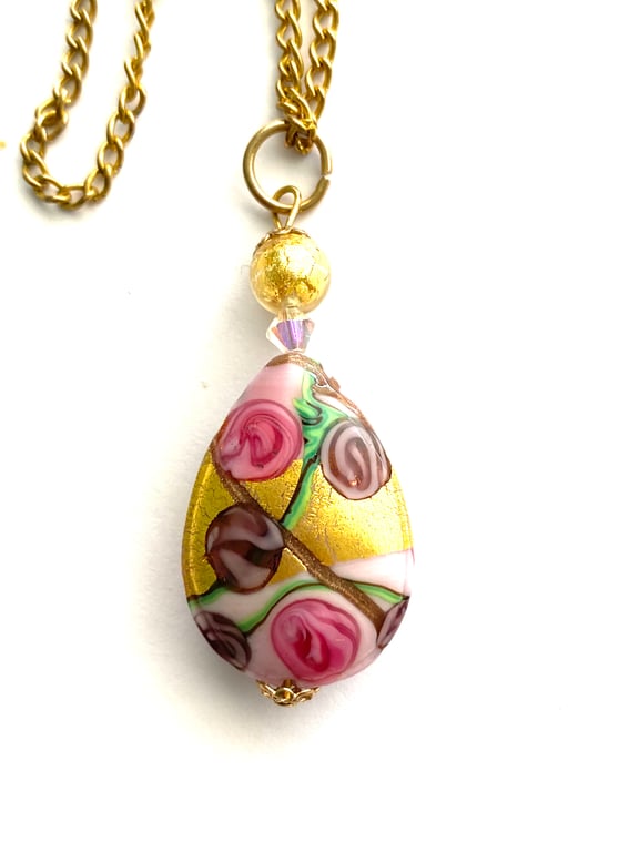 Murano glass gold and pink pear drop pendant with Swarovski crystal.