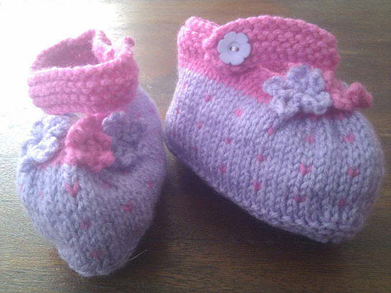 Pink and purple knitted baby booties
