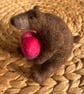 Needle felted bear holding a heart