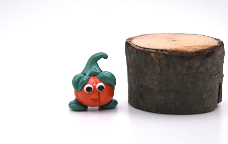 small glass pumpkin figure