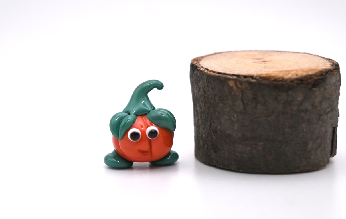 small glass pumpkin figure