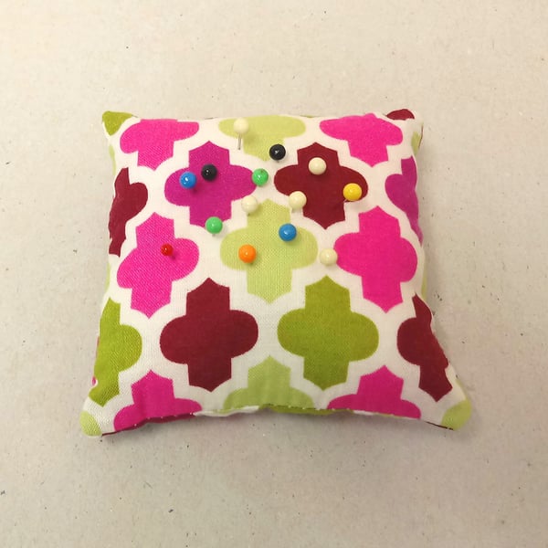 Pin cushion in bright pink and green, square shape, sewing accessory