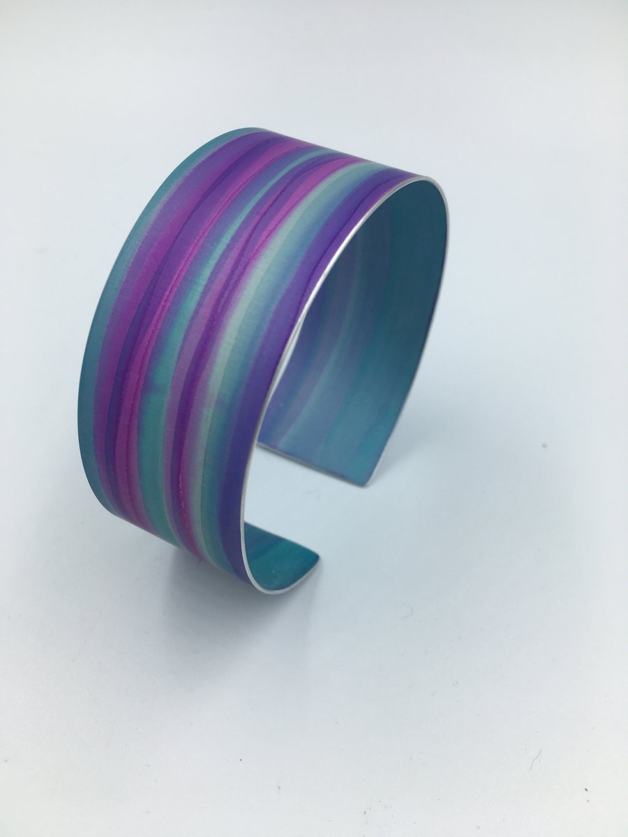Watercolour striped pink and blue anodised aluminium cuff