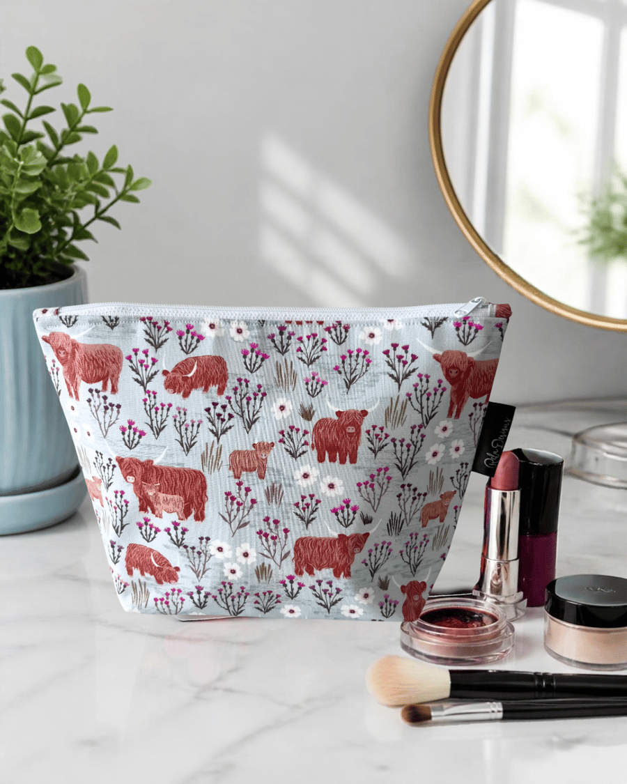 Image of Makeup bags highland cows and thistles