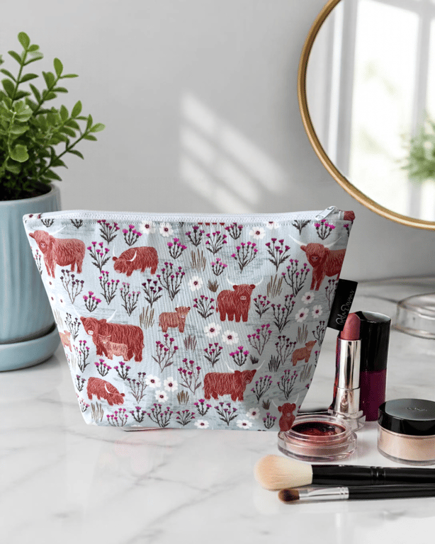 Makeup bags highland cows and thistles