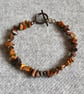 Tiger’s Eye Chip Bracelet with Orange and Black Crystal Bicone Accent Beads - Image 2