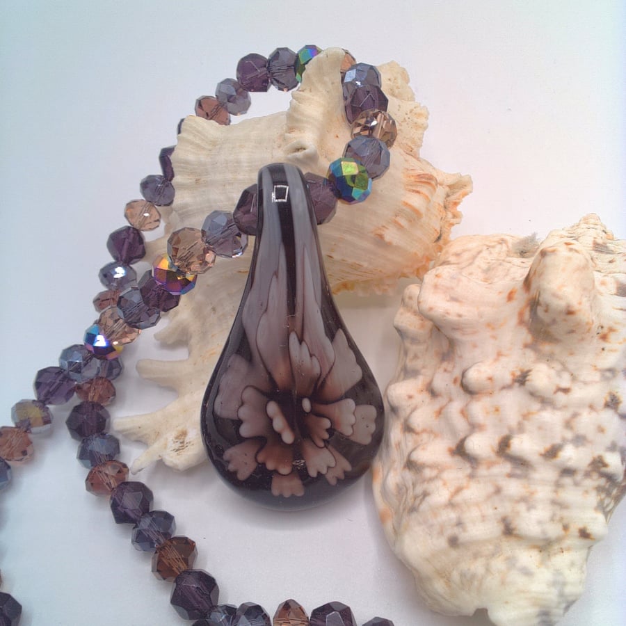 Purple Floral Patterned Glass Pendant on a Mixed Purple Crystal Necklace