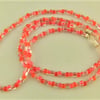 Cord for Glasses Made Using Small Red and Clear Glass Beads