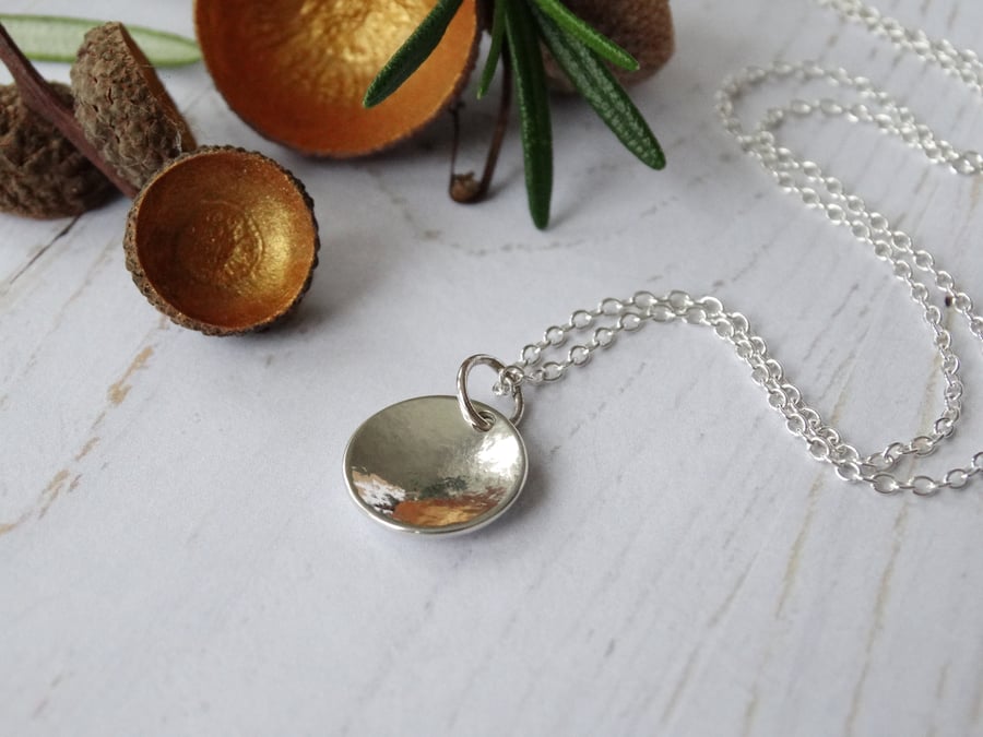 Simple domed disc pendant in recycled silver