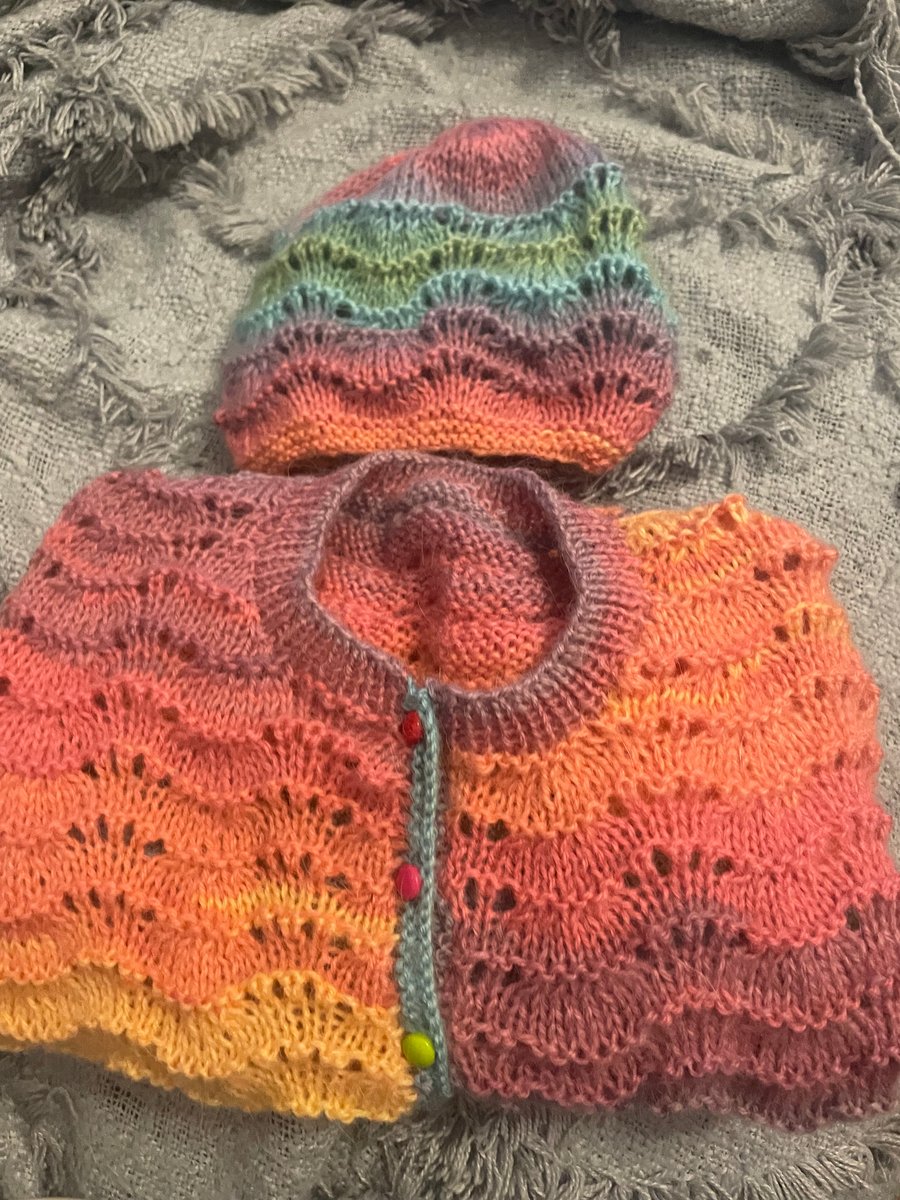 Hand knitted cardigan and hat