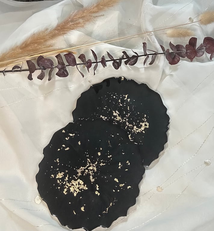 Black and gold-leaf round resin coasters