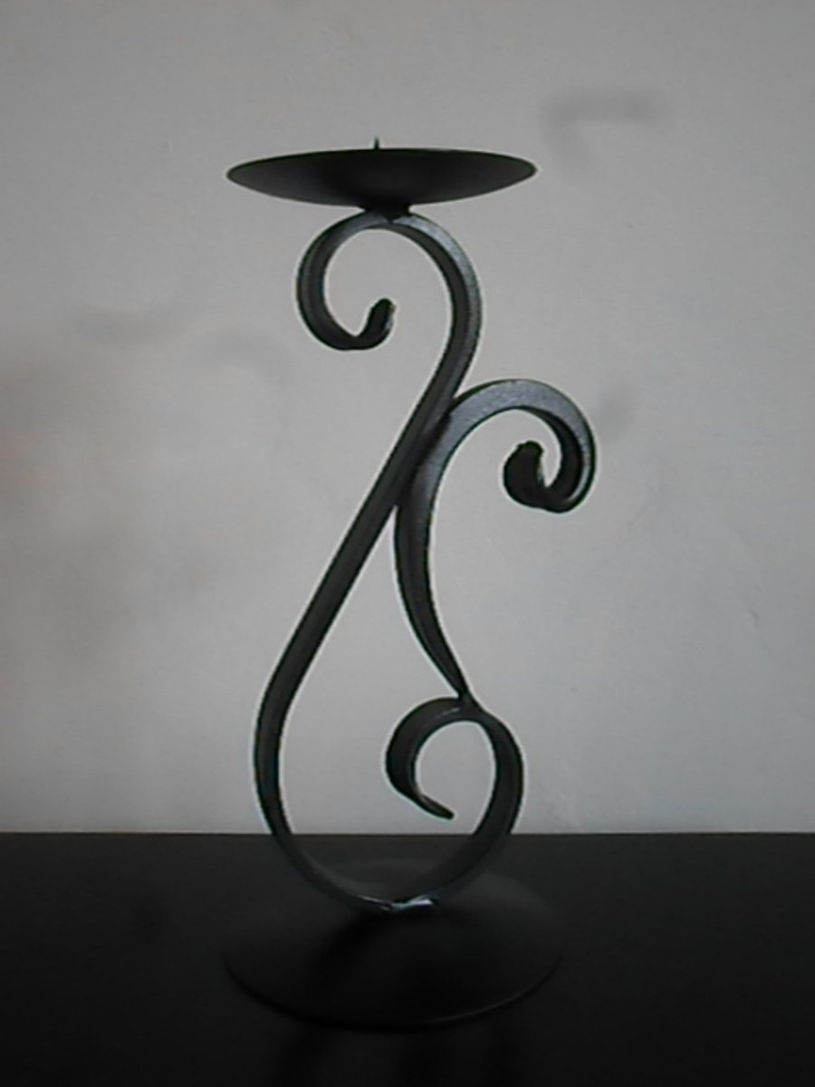 Scrolled Candle Holder....................Wrought Iron(Forged Steel) 