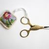 Grey felt scissor keeper with dog rose embroidery