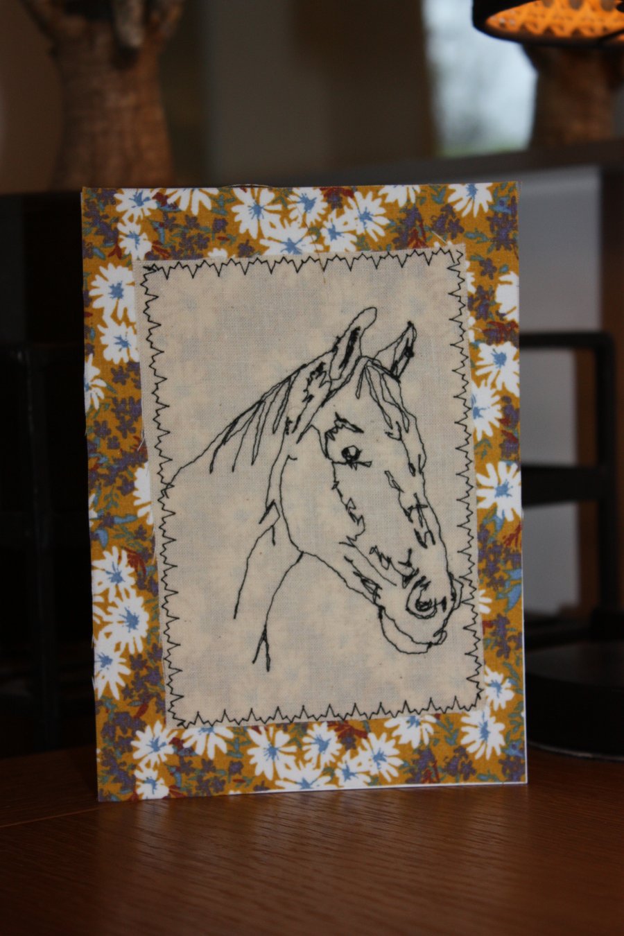Horse head with a floral border