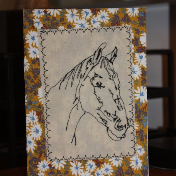 Horse head with a floral border
