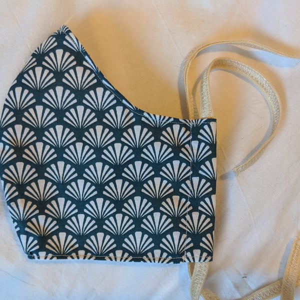 Cotton face covering with art deco fan print