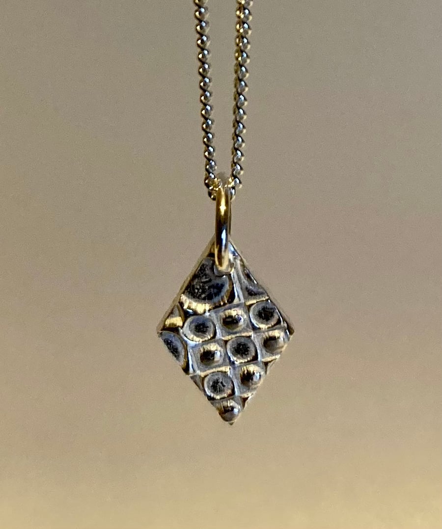 Small, diamond shaped, pure silver necklace 