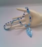 Necklace with Blue and Clear Bicone Beads and a Shell Pendant, Blue Pendant - Image 6