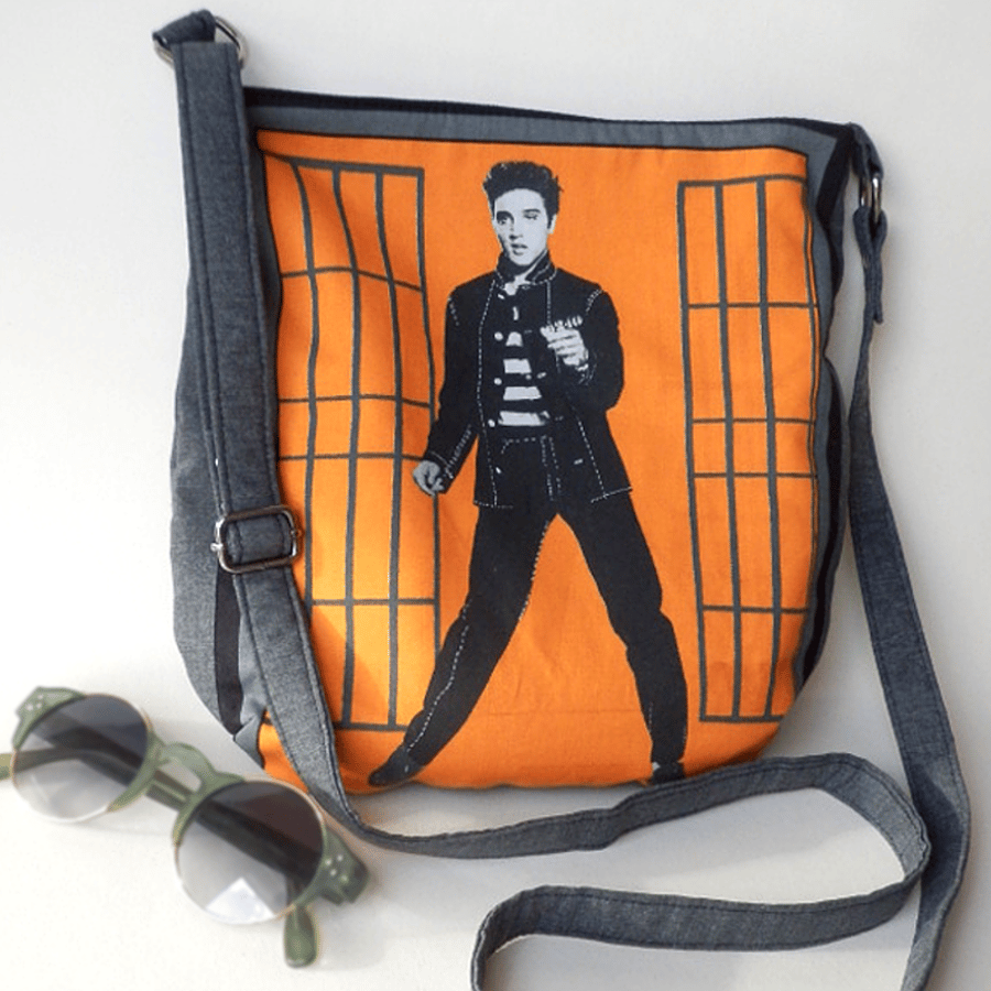 Funky orange, crossbody bag with Elvis image from Jailhouse Rock